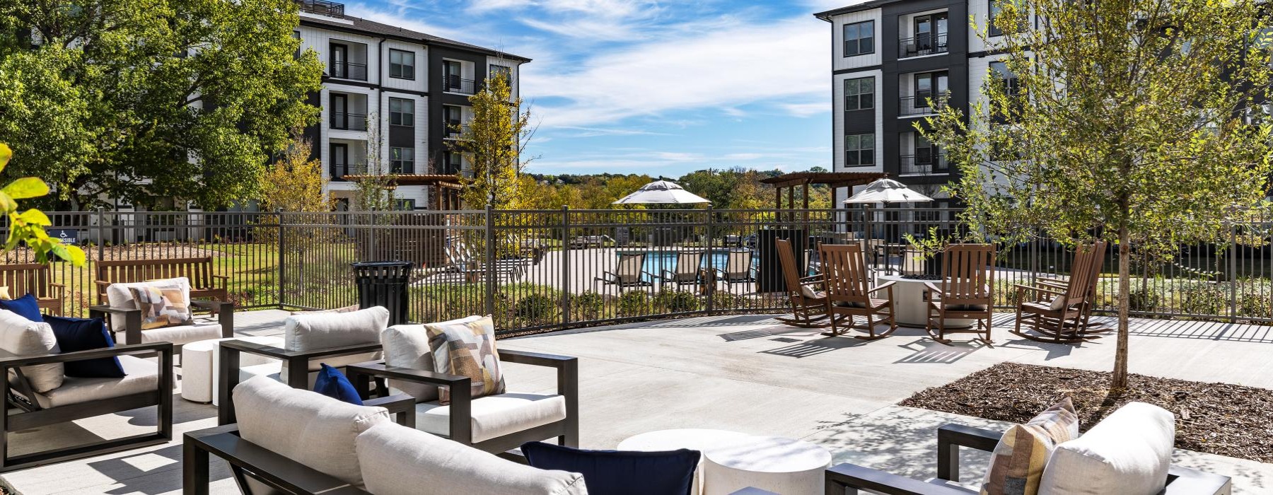 Large pool deck with lounge seating 