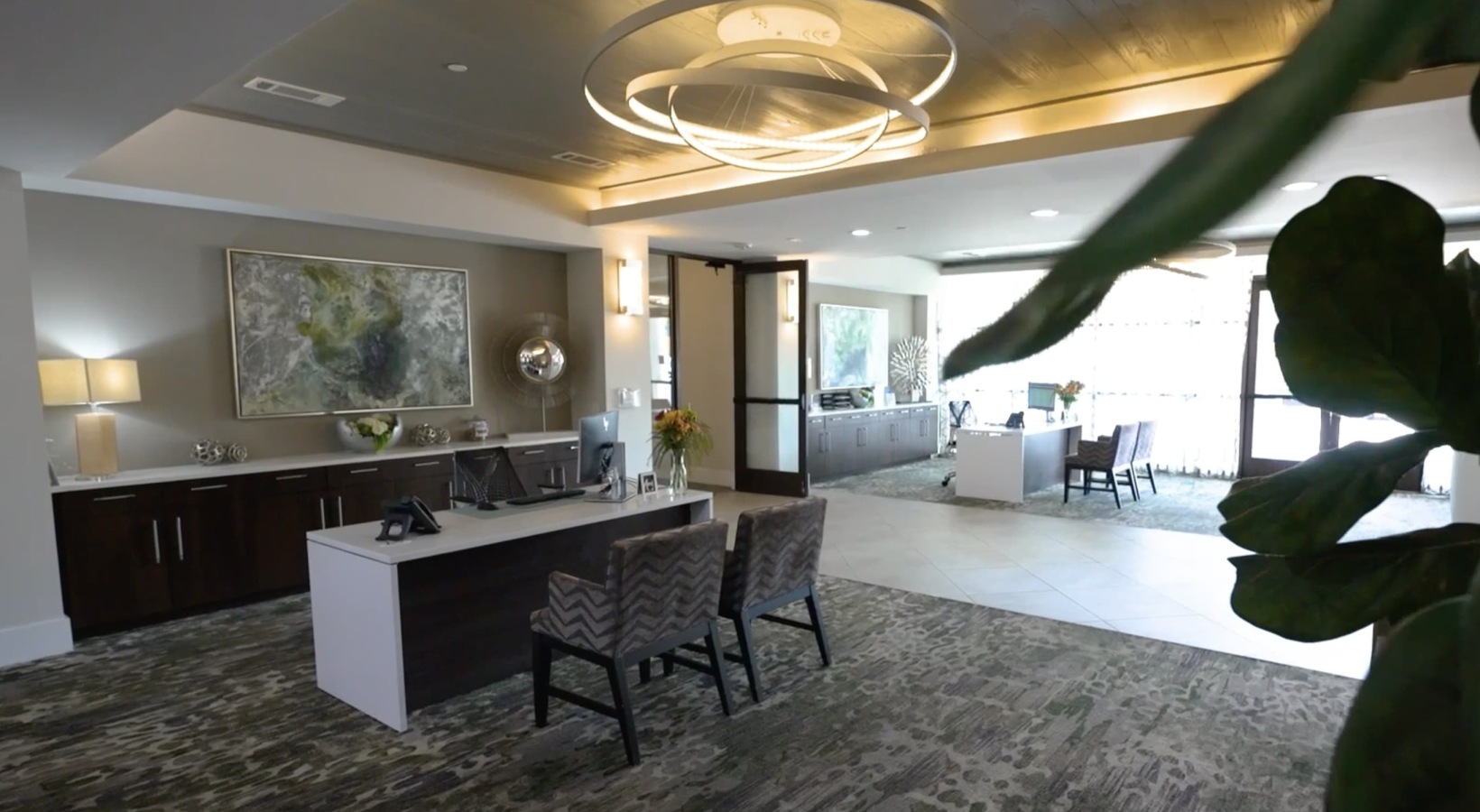 lounge and lobby with modern decor and spacious seating