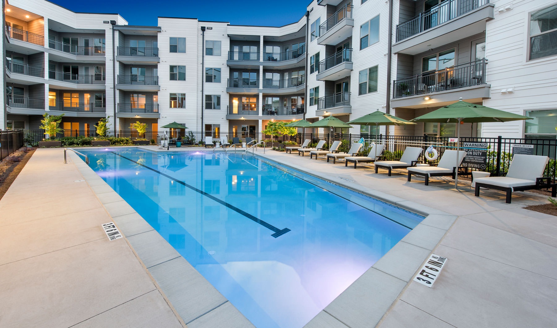 swimming pool lit at night