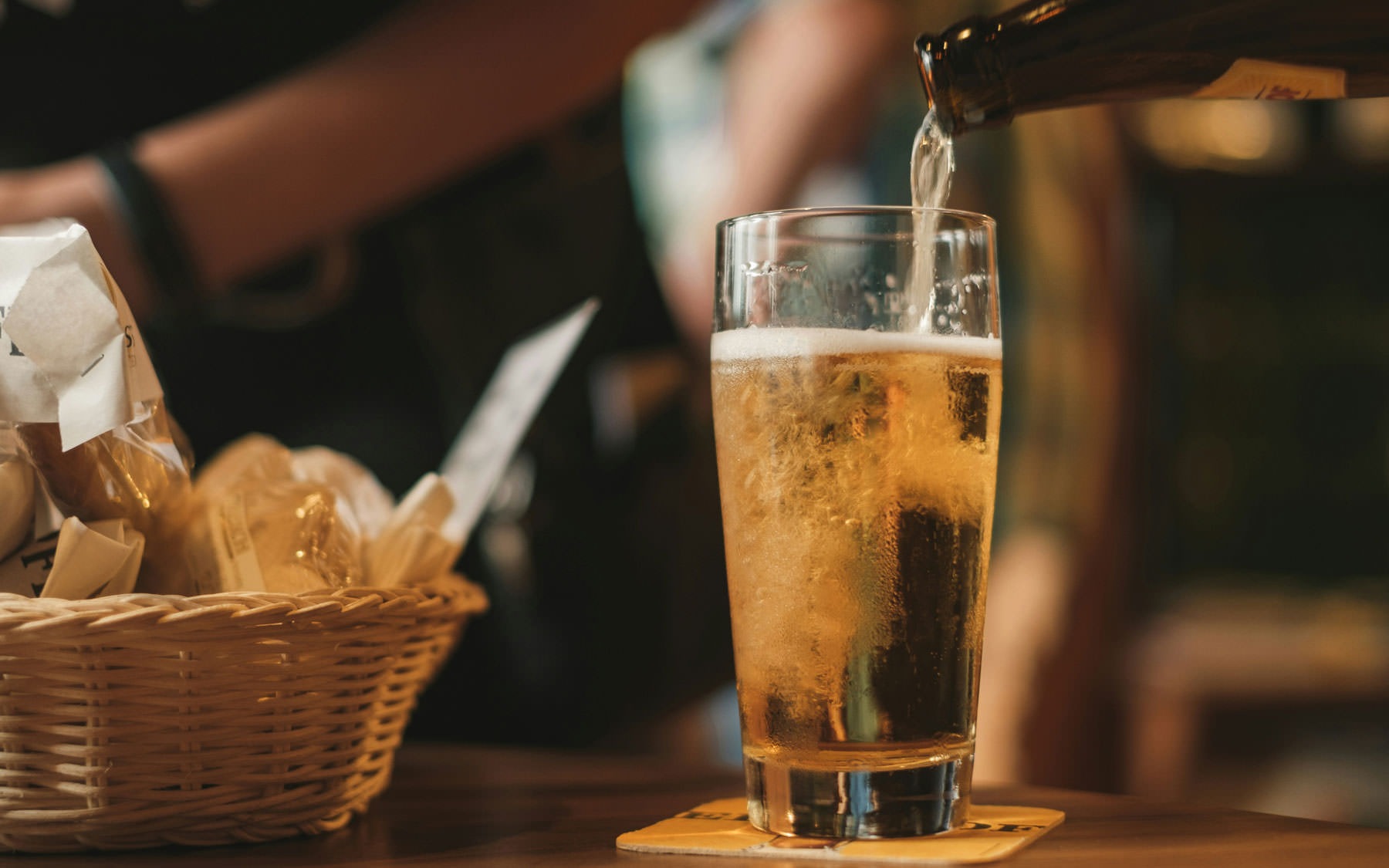 Nearby Activities & Attractions beer being poured into glass at a bar