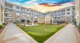 Large putting green located in the courtyard