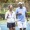 Couple walking on a tennis court after a match 