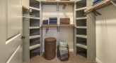 large closet with custom shelving