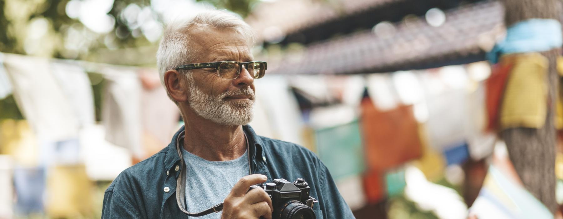 a man holding a camera