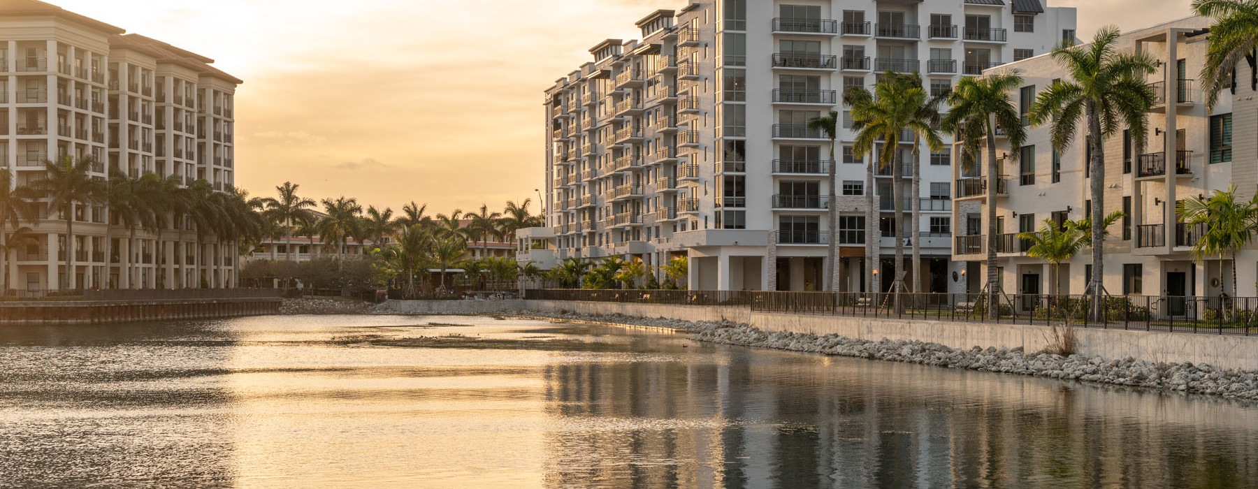 a body of water with buildings along it