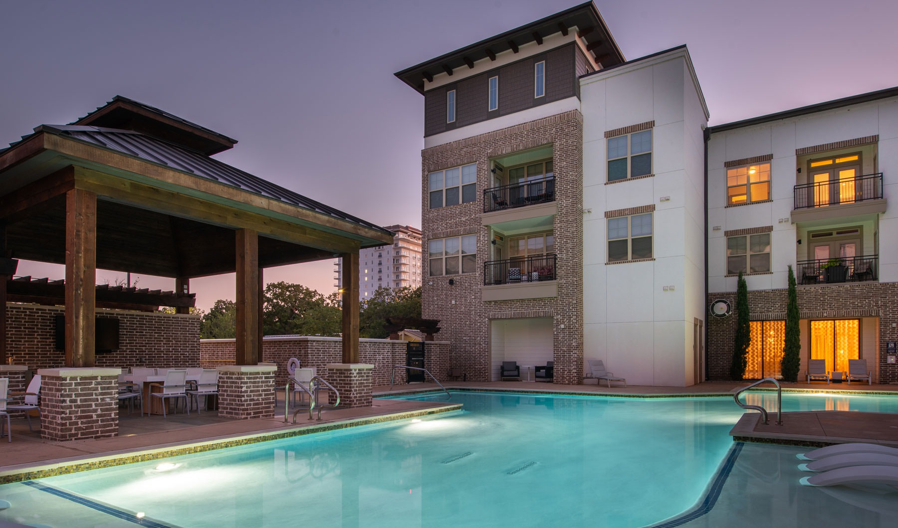 a swimming pool at an apartment community