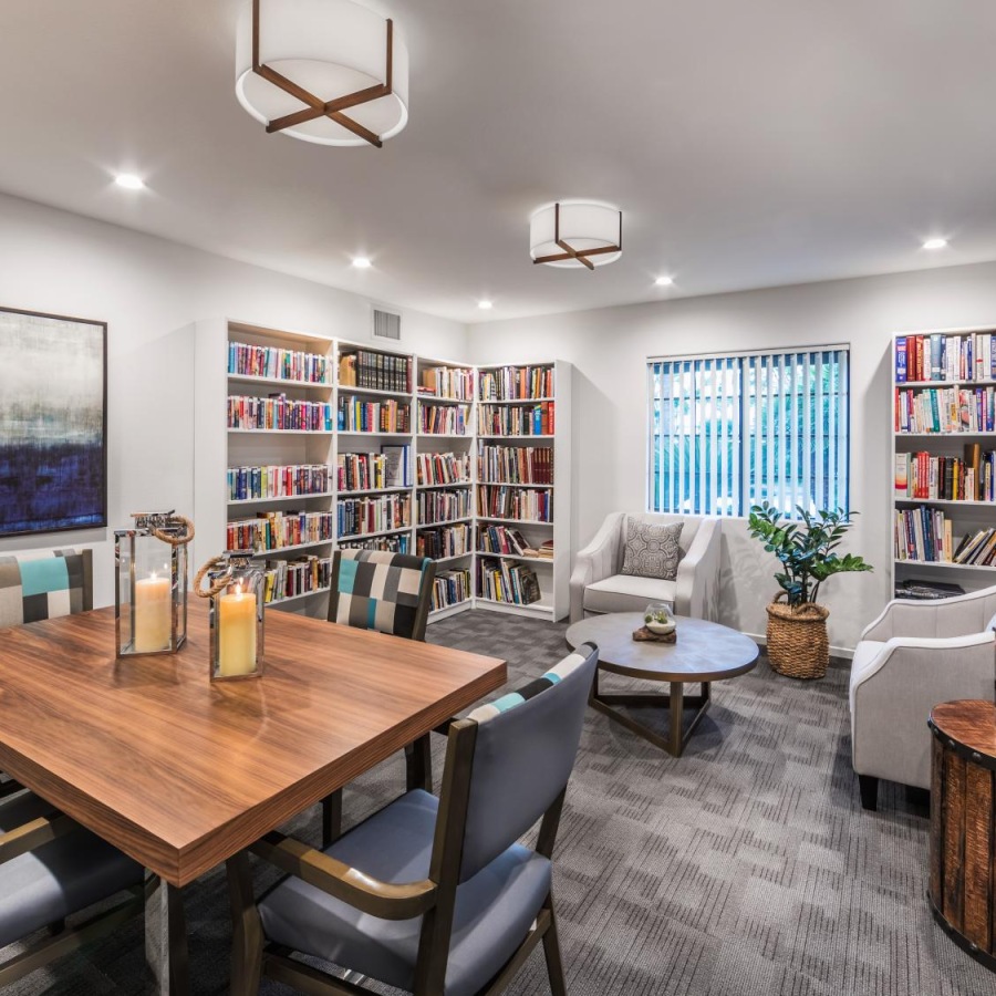 Find your perfect fit at Overture San Marcos a room with a table and chairs