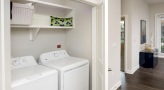 laundry closet with side-by-side washer and dryer