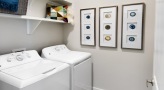 side-by-side washer/dryer units in laundry room