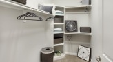 walk-in closet with light fixture