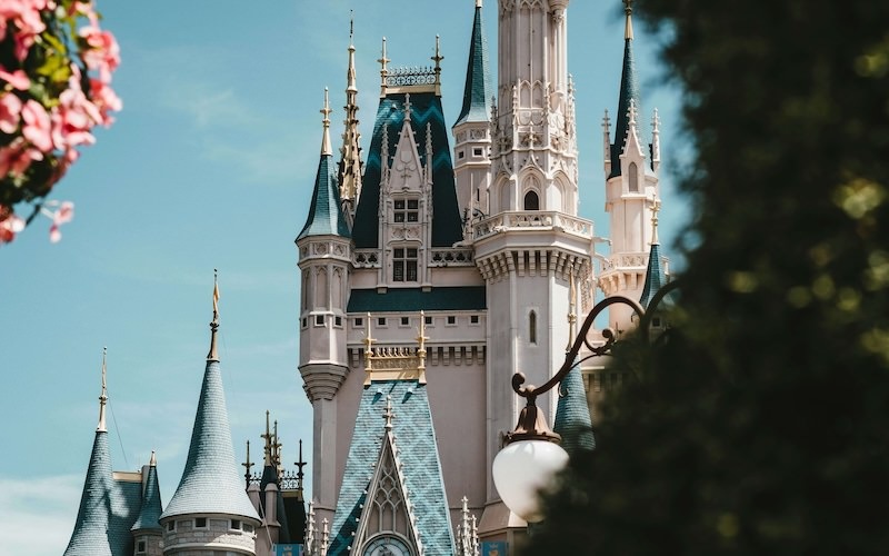trees and castle with a blue sky
