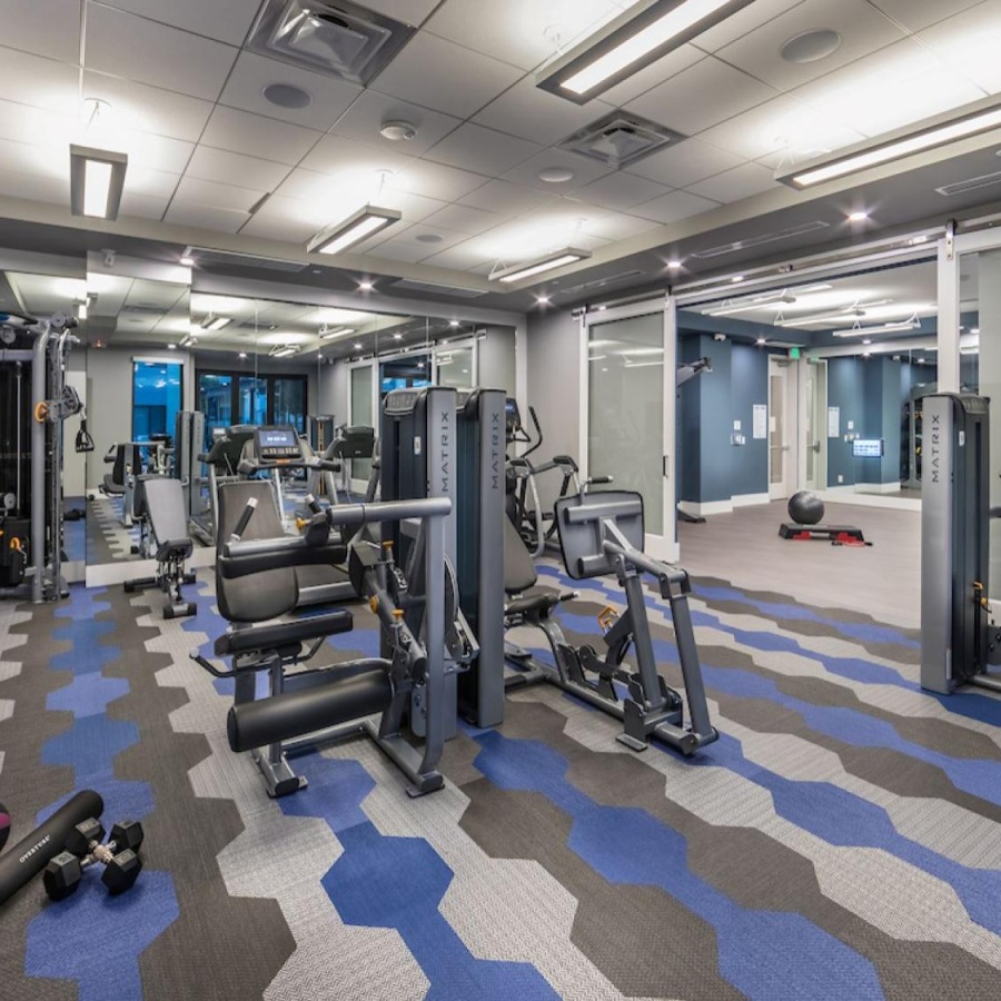 Cutting-edge amenities at your fingertips Fitness center at Destinations Pueblo apartments in Summerlin, NV, featuring exercise machines and cardio equipment.