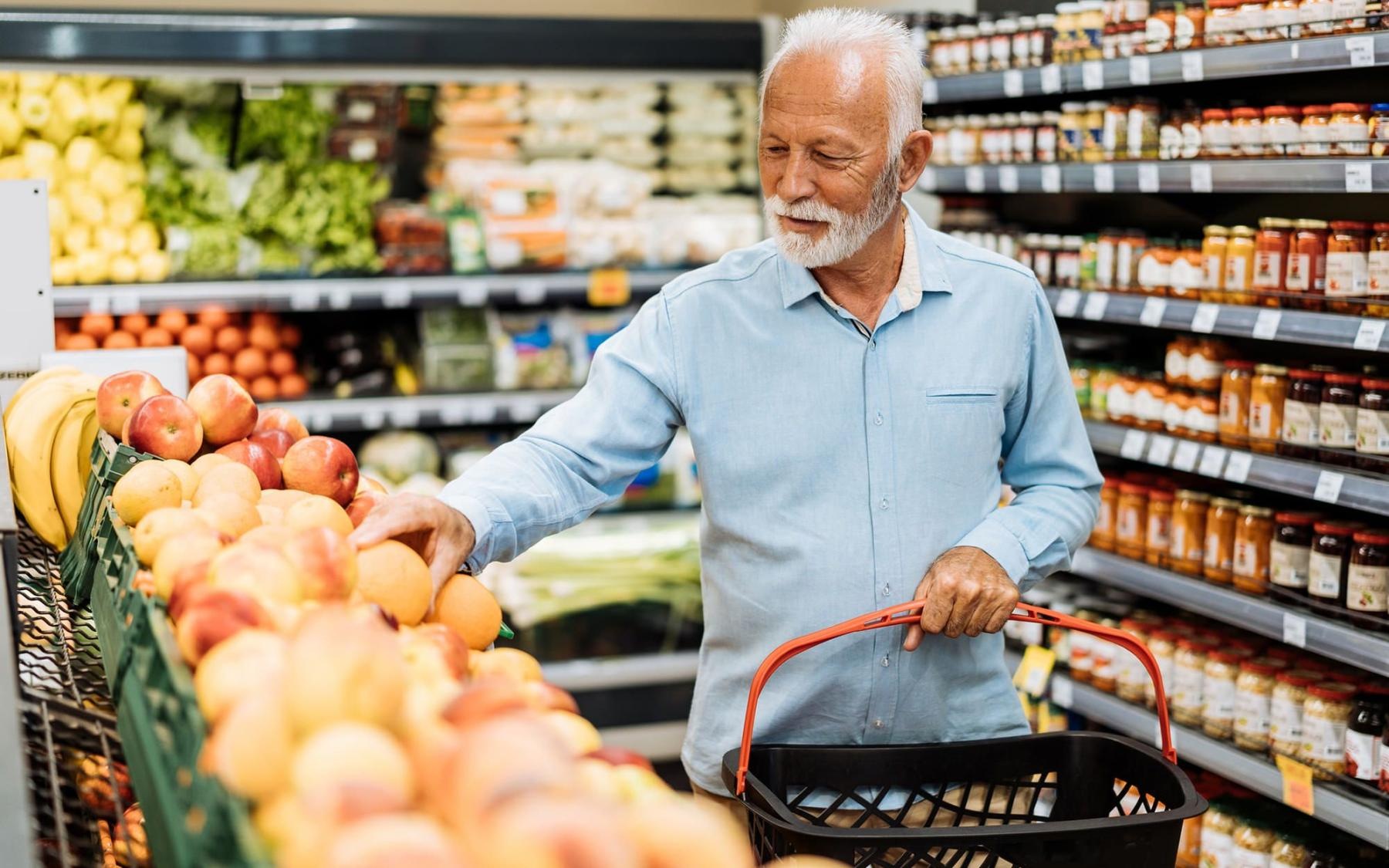 Grocery Store Man shopping in a large grocery store