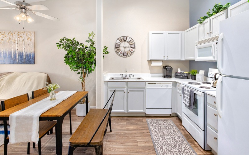 kitchen with white cabinets and appliances