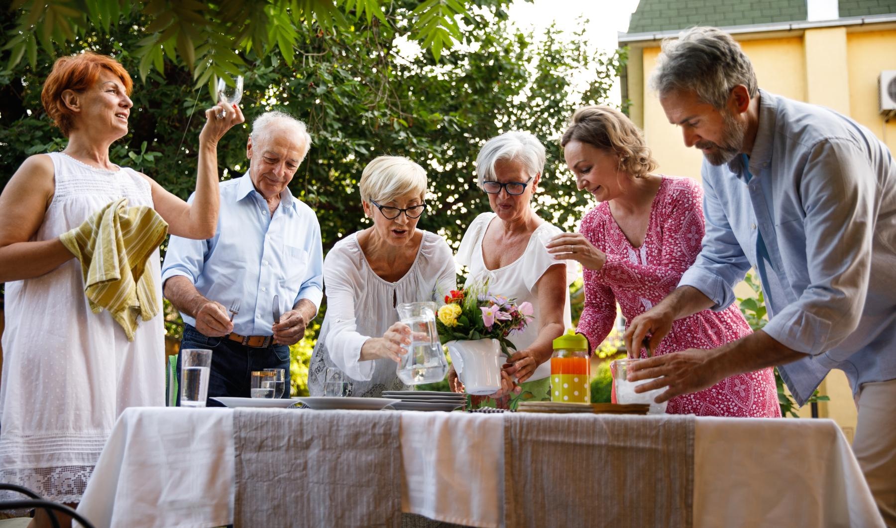 Your Story to Create a group of people preparing a table of beverages
