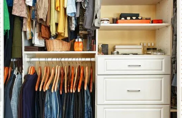 A bedroom closet with organized sections including clothes and jewelry.