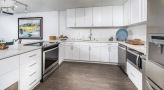 kitchen with white cabinets and stainless steel appliances