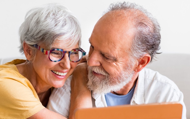 Nearby Activities & Attractions man and woman looking at a screen together