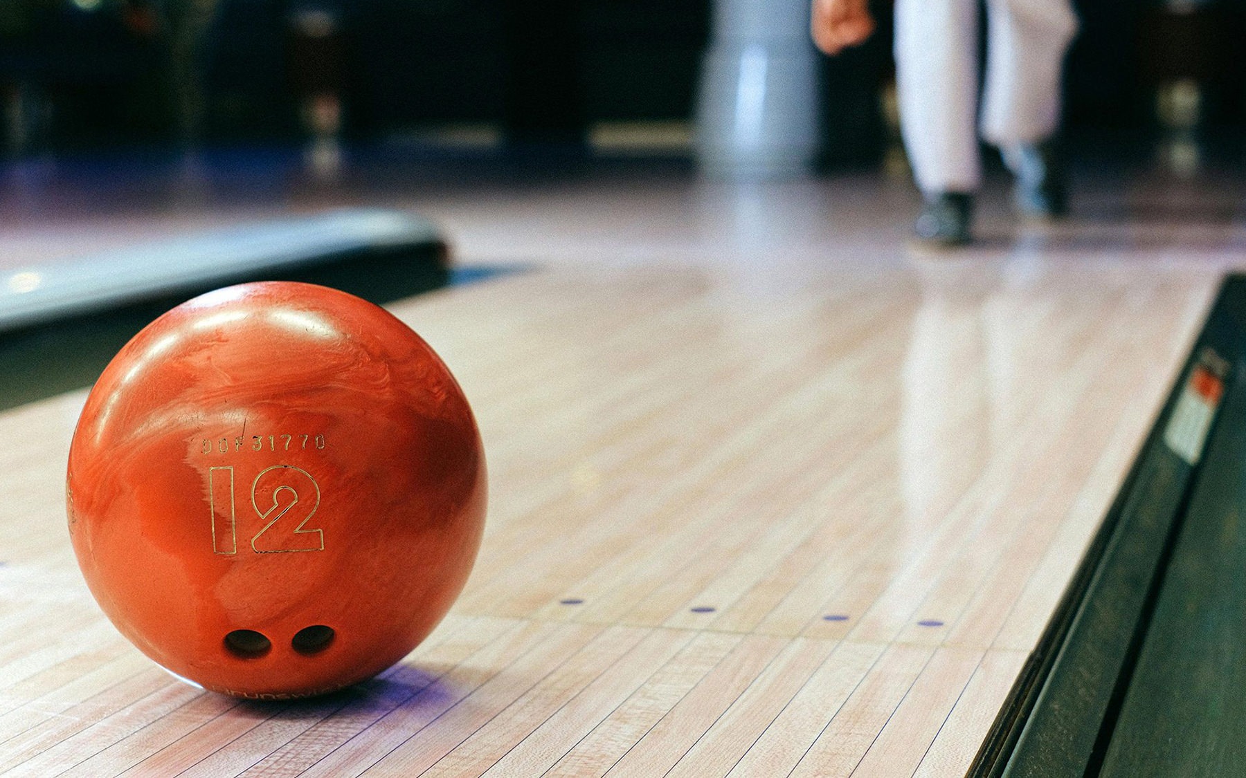 Bowling ball rolling down the lane