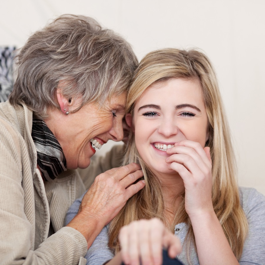 woman and girl laughing