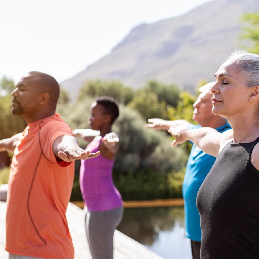 Get your workout on People exercising outdoors near Destinations Pueblo apartments in Summerlin, NV, featuring natural lighting.