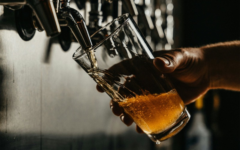 Beer Person pouring a beer