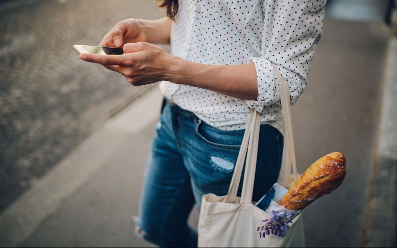 Nearby Activities & Attractions woman holding a bag with bread