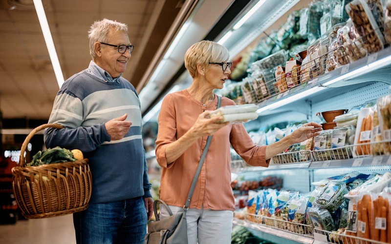 Find your perfect fit at Overture Plano a man and woman grocery shopping