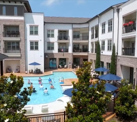 Large sparkling blue swimming pool 