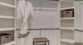 large closet with custom shelving