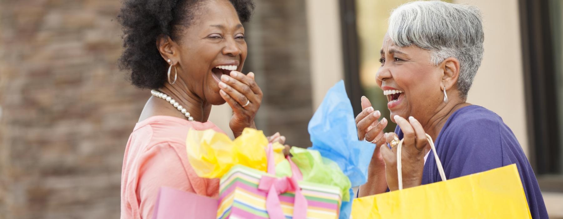 Friends out shopping and holding bags