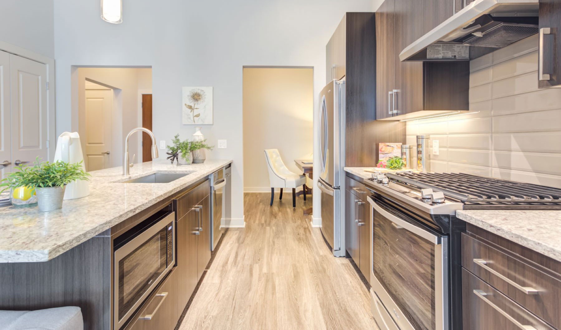 Find your perfect fit at Overture Yorktown a kitchen with black counter tops